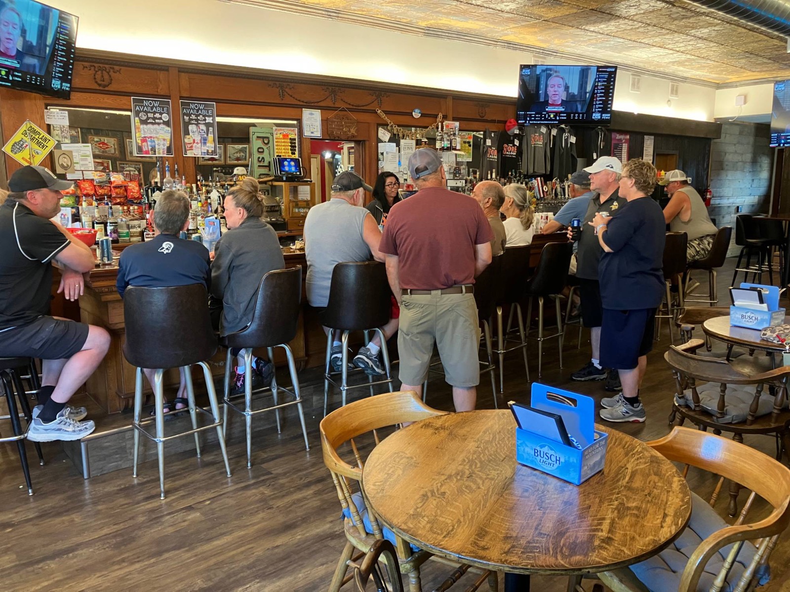 Regulars gathered around the bar
